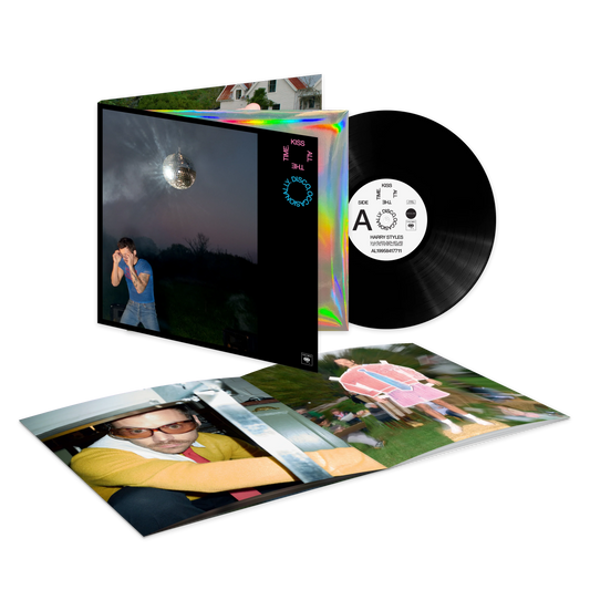 Open gatefold of Harry Styles Kiss All The Time Disco vinyl with black LP and photo print insert