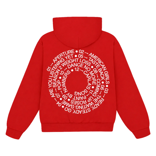 Back of red Harry Styles tracklist hoodie with white spiral tracklist print circling the centre