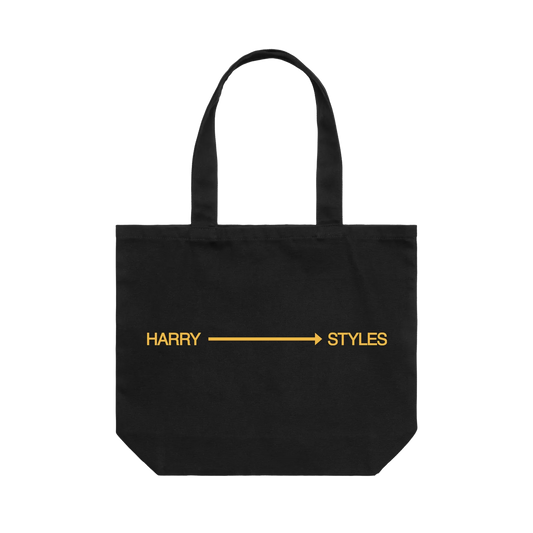 Black extra large canvas tote bag by Harry Styles with a yellow Harry arrow Styles print