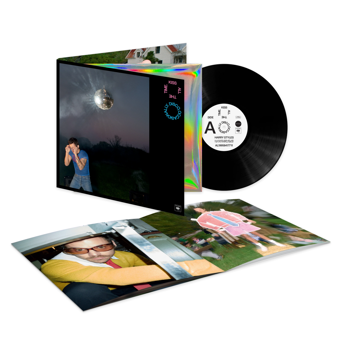 Open gatefold of Harry Styles Kiss All The Time Disco vinyl with black LP and photo print insert